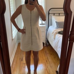 White dress but has some shimmer in the material.